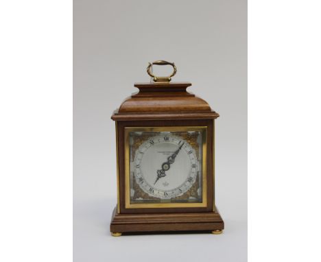 An Elliott mantle clock, the dial inscribed the Northern Goldsmiths Co, Darlington, wind up movement