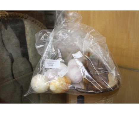 A collection of eight polished marble eggs and a simulated tortoishell ring box including a circular mounted mirror (1 bag)
