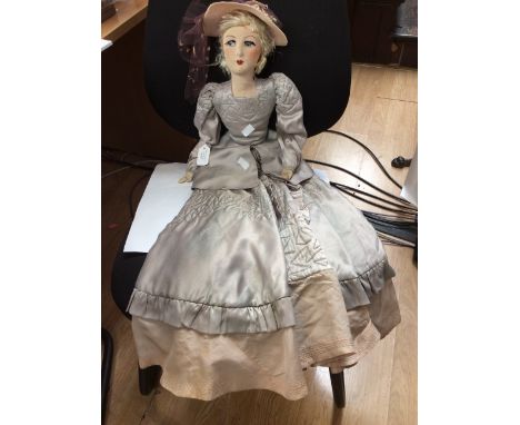 A tall Lesley's Creation Doll USA with original clothing and hat, approx 75cm tall