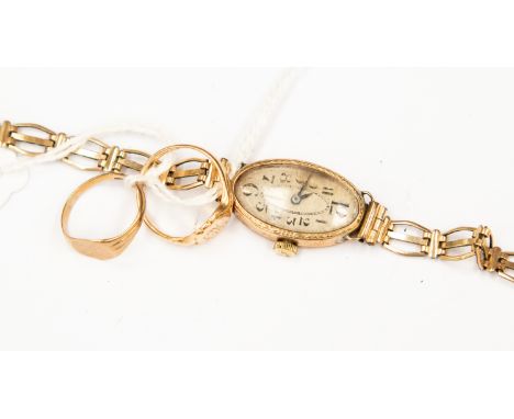 A ladies 9ct gold cased early 20th Century mechanical wind wristwatch, rolled gold bracelet, a 9ct gold ring and an 18ct gold