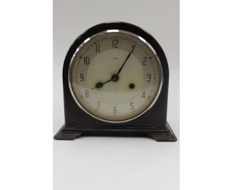A Bakelite tin field bracket clock 