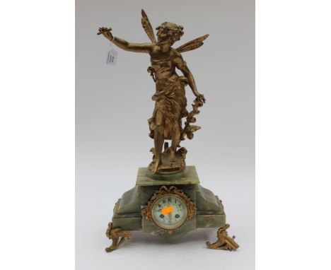 A French 19th century gilt spelter and onyx mantle clock with applied seal, fabrication Francaise a/f
