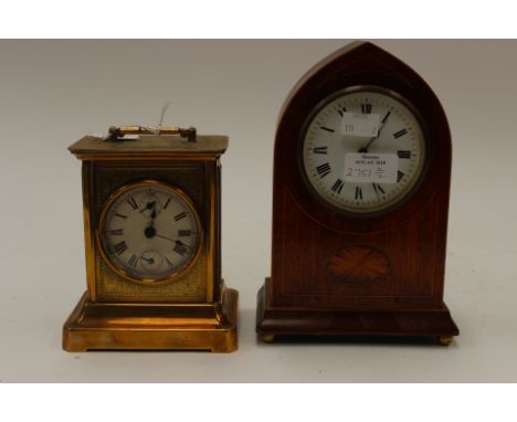 An Edwardian Regency Revival mantle clock, together with a brass cased carriage clock (2)