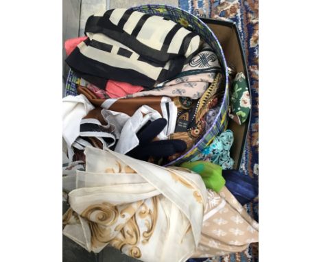 A collection of scarves and gloves 1950/60s together with a hat box containing scarves.