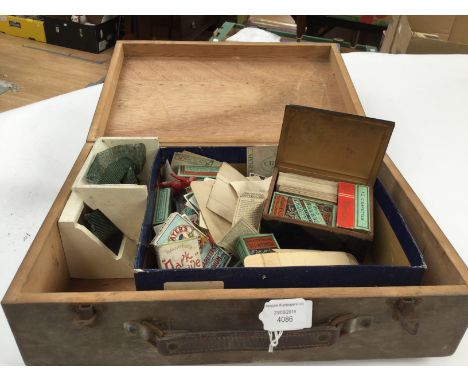 A wooden box of cigarette cards, some in packets and loose, part Subbuteo game
