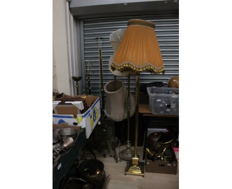 Five various brass floor standing lamp bases
