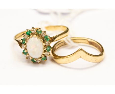 Two 9ct gold rings, comprising an opal dress ring and a plain wishbone, size R and L, with a combined total gross weight appr