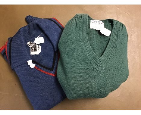 Two Iconic Ossie Clark longline sweaters from 1962/3, one is Air Force blue with a sheared knitted waistband edged in rust wi