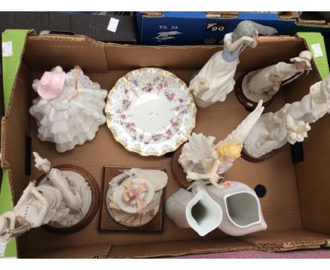 A collection of seven ceramic figures and one jug, vase and a Royal Crown Derby plate 