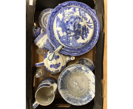 A 19th Century Spode style blue and white Willow pattern soup tureen, a cover and ladle; together with an extensive collectio