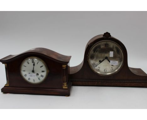 An Edwardian mahogany eight day mantle clock, together with an early 20th Century oak eight day mantle clock (2)