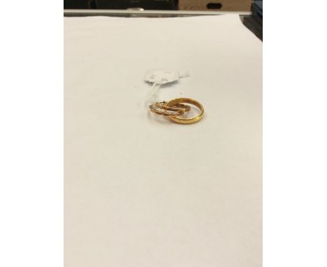 A yellow metal ring and 9ct gold hoop earrings (3) 