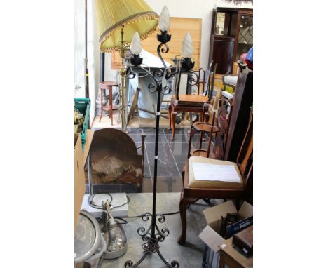 Black metal standard lamp with three candle bulbs