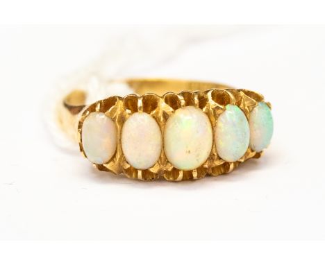 An 18ct gold and opal five-stone ring, Birmingham 1900, ring size P, approx 5.1gms 