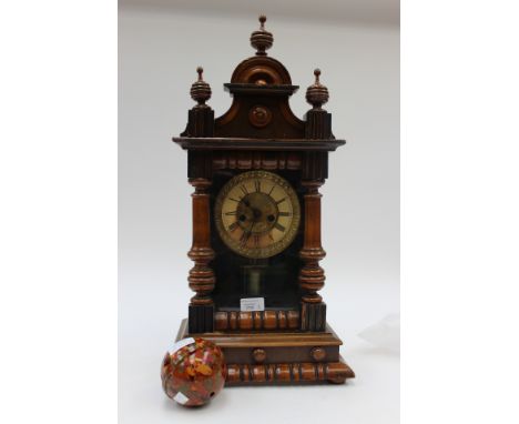 A Victorian mantle clock and a marbled bakelite string holder