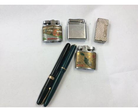 A Dunhill 'Rollolite' cigarette lighter, stamped U.S Patent No. 2. 102. 108, (white metal), together with a Waterman fountain
