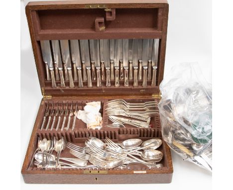 An oak canteen containing various flatware, together with a collection of silver plate, EPNS, white metal flatware, condiment