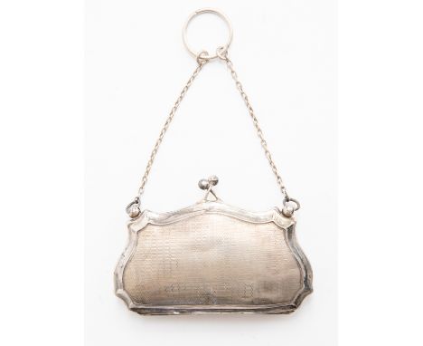 An Edwardian shaped engine turned purse, Chester 1910