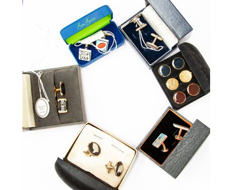 A collection of six sets of boxed cufflinks, to include; a pair of Liberty silver plated and silk oval cufflinks, a pair of C