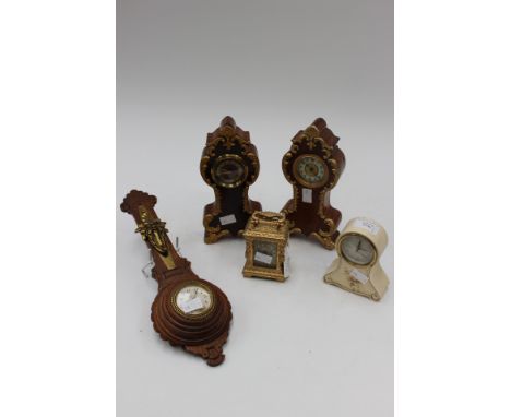 An oak cased wall clock, Waterbury Clock Co, circa 1891, USA, an overpainted carriage clock, two similar Edwardian mantle clo