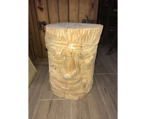 HAND CARVED TREE TRUNK SCULPTURE