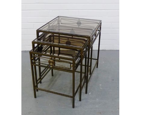 A nest of three glass topped tables, together with a matching lamp table  55 x 45cm (4) 