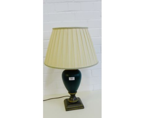 A contemporary ceramic green and bronze coloured table lamp base, complete with pleated shade 