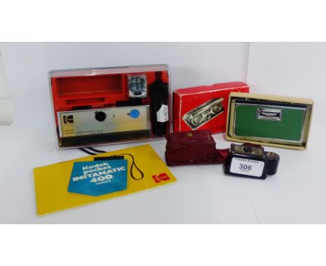 A Coronet Midget camera, complete with red leather outer case, a set of Rand No.1 folding opera binoculars and a vintage Koda