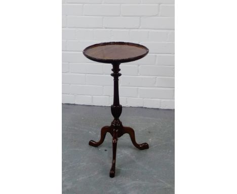 A mahogany wine table on tripod supports, 56 x 30cm