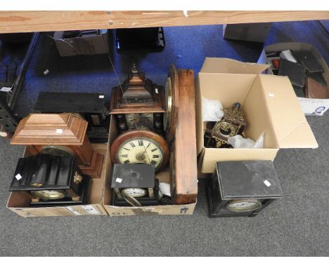 A quantity of various clocks for repair and restoration, to include a German walnut mantle clock, two slate mantle clocks, a 