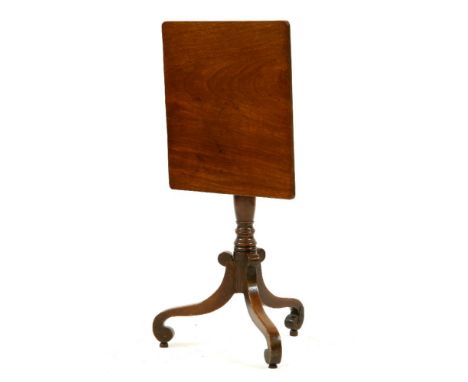 A Regency mahogany tilt top lamp table, the square top on central column and tripod scroll base, 51cm wide x 51cm deep x 70cm