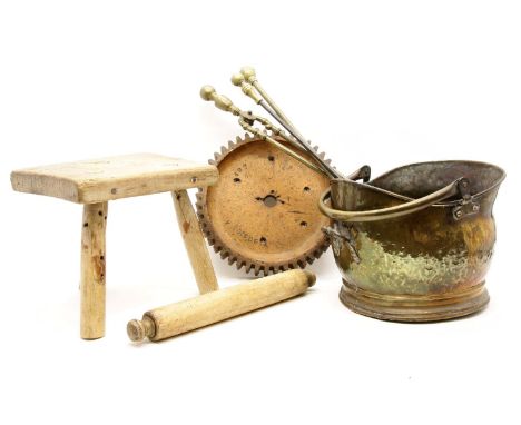 A quantity of treen, including four rolling pins, a copper coal scuttle, fire dogs and tools, and six related brass fire item