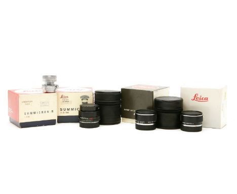 Three Leica lenses: Summicron F=5cm 1:2,  Nr. 1203015; Extender - R 2x, no. 3237732;  Summicron - R 1:2/50, no. 2265889, and 