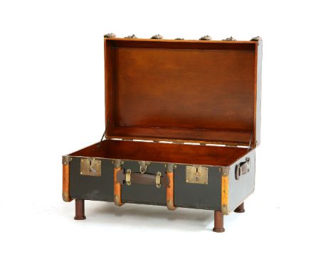 A 'By Land & By Sea' ebonised and wooden bound trunk table, with leather handles, on turned legs, 80cm wide, 55cm deep, 46cm 