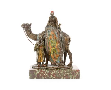 A spelter Camel match striker/lighter, mounted on a marble plinth, 20.5cm