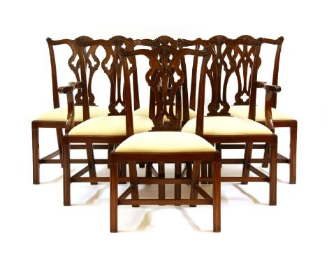 A set of six reproduction Chippendale style mahogany dining chairs, including a pair of elbow chairs, the carvers each 68cm x