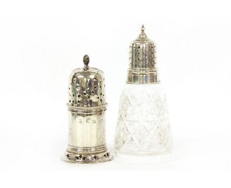 A George III silver caster, the acorn finial over a pierced cover, London, hallmarks rubbed, 14cm high, together with a 20th 