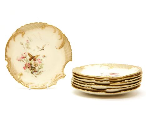 A set of eight Royal Worcester blush ivory dessert plates, of shell form and each decorated with floral sprays and insects wi