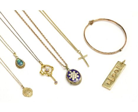 A collection of gold items, to include a 9ct gold ingot, 14.58g, a 9ct gold hollow hinge bangle with engraved decoration, 3.5
