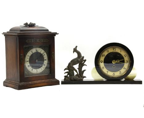 A George lll table clock, the movement striking a gong, 32cm high, with an Art Deco clock mounted with a spelter figure of a 