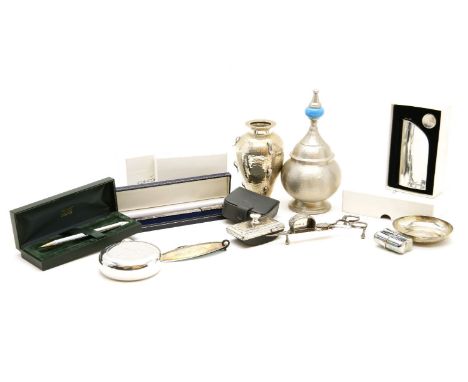 A small quantity of Concorde commemorative items, to include a silver key ring, a spirit flask, a Concorde propelling pencil,