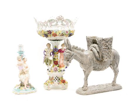 A Sitzendorf candlestick, another centrepiece and a pottery donkey