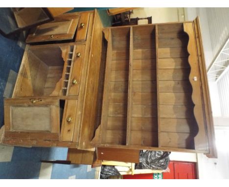 A 19th Century Pine Kitchen Dresser, the Base with Three Short Drawers, Centre Open Display and Flanked by Two Cupboards, Rai