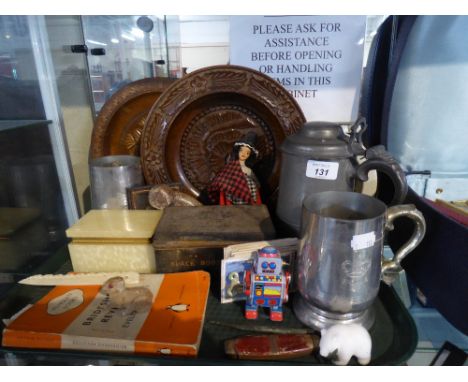 A Tray of Curios to Include Vintage Tin, Pewter Tankard, Onyx Box, Carved Wooden Plates Etc
