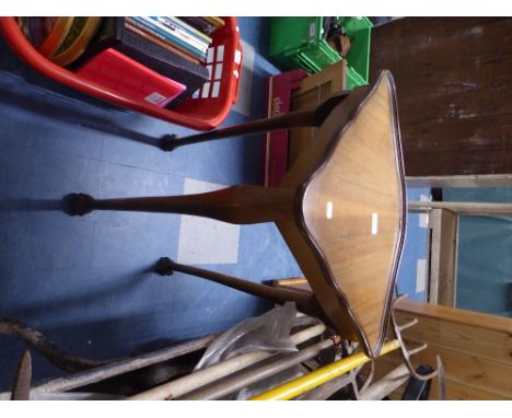 A Walnut Tripod Corner Table with Claw and Ball Feet