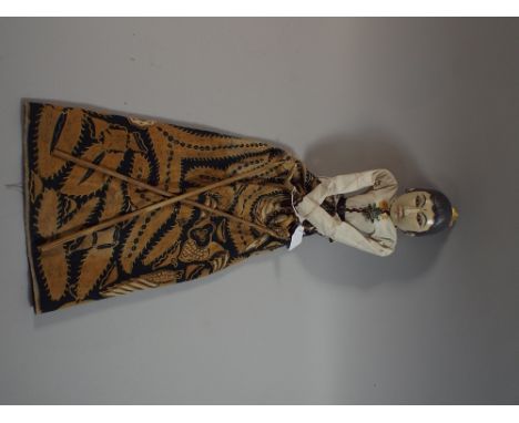 A Vintage Malaysian Wooden Head Puppet in Original Dress 