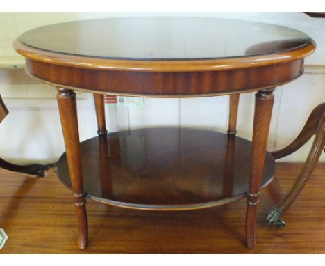 A reproduction inlaid Mahogany occasional table, a shaped snap top table and a circular tripod table 