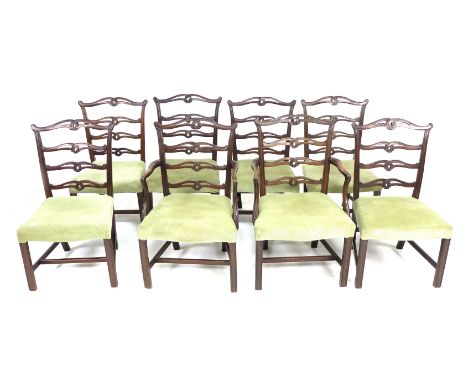 A set of eight reproduction Georgian style mahogany dining chairs, with Chippendale style ladder backs, carved and moulded fr