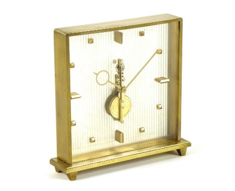 A Jaeger LeCoultre Pendule Baguette clock, circa 1960s, with raised gilt metal hour markers and frame, frosted glass back wit