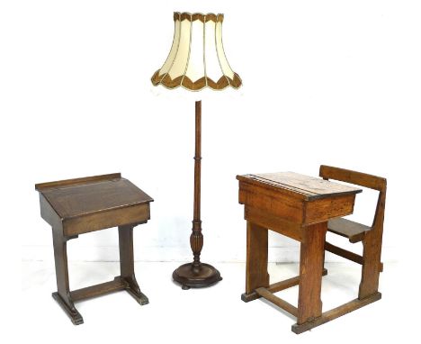 Two vintage school desks, one mahogany, 59 by 50 by 69cm high, and one oak with integral bench, 63 by 80 by 85cm high, togeth